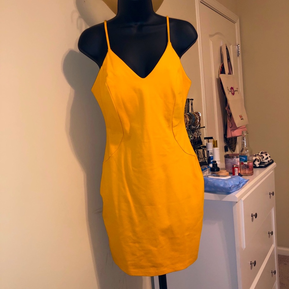 Yellow strapped dress never worn